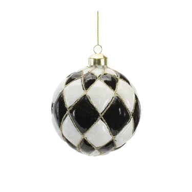 Glass Harlequin ornament by Melrose, black and white diamond pattern with gold glitter, gold cap and hanger