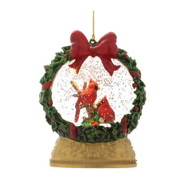 Melrose LED Cardinal Globe Ornament; 5”H, red cardinal in green holly wreath with red bow