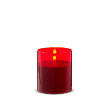 Red glass pillar candle in a red glass holder, 3.5x4 in, lit