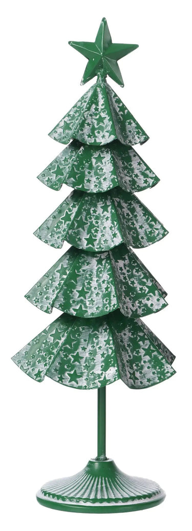 Small whitewash artificial Christmas tree with green star-patterned tiers and a star topper on a green pedestal.