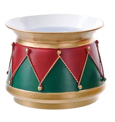 Metal nutcracker drum container with red and green panels, gold trim and rope accents.