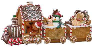 Resin gingerbread train with locomotive and two gold cars, candy cane trim, and festive gingerbread figures.