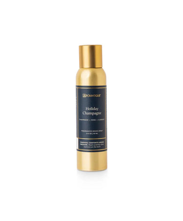 Holiday Champagne Aerosol Room Spray by Aromatique; gold bottle with navy label.