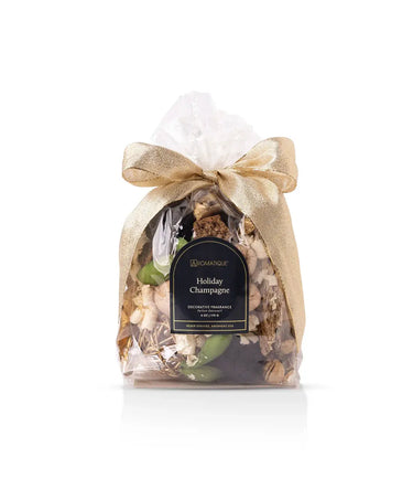 Holiday Champagne potpourri bag by Aromatique; clear gift bag tied with a gold ribbon and tag.