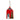 Red iron house ornament by A&B, 3.5x6 in, with hanging string, white door, arched window, and pine tree.