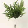 Silk Norfolk pine bush, green, 17-inch arrangement in a clear glass vase