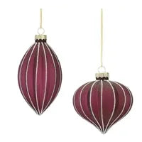 Two burgundy glass ornaments with white piping, gold caps, and hanging strings