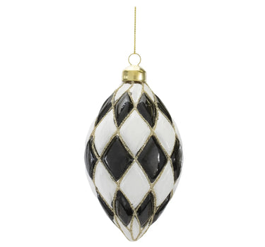 Glass ornament with black and white harlequin diamonds, gold glitter accents, and a gold hanging loop by Melrose.
