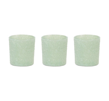 Three frosted sage glass votive holders, 3 in diameter by 3.25 in high.