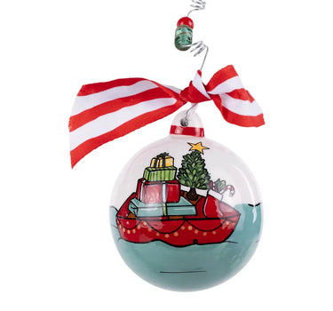 Glory Haus Boat & Presents Ornament, 6-inch holiday ornament with red boat, gifts, tree, and striped bow.