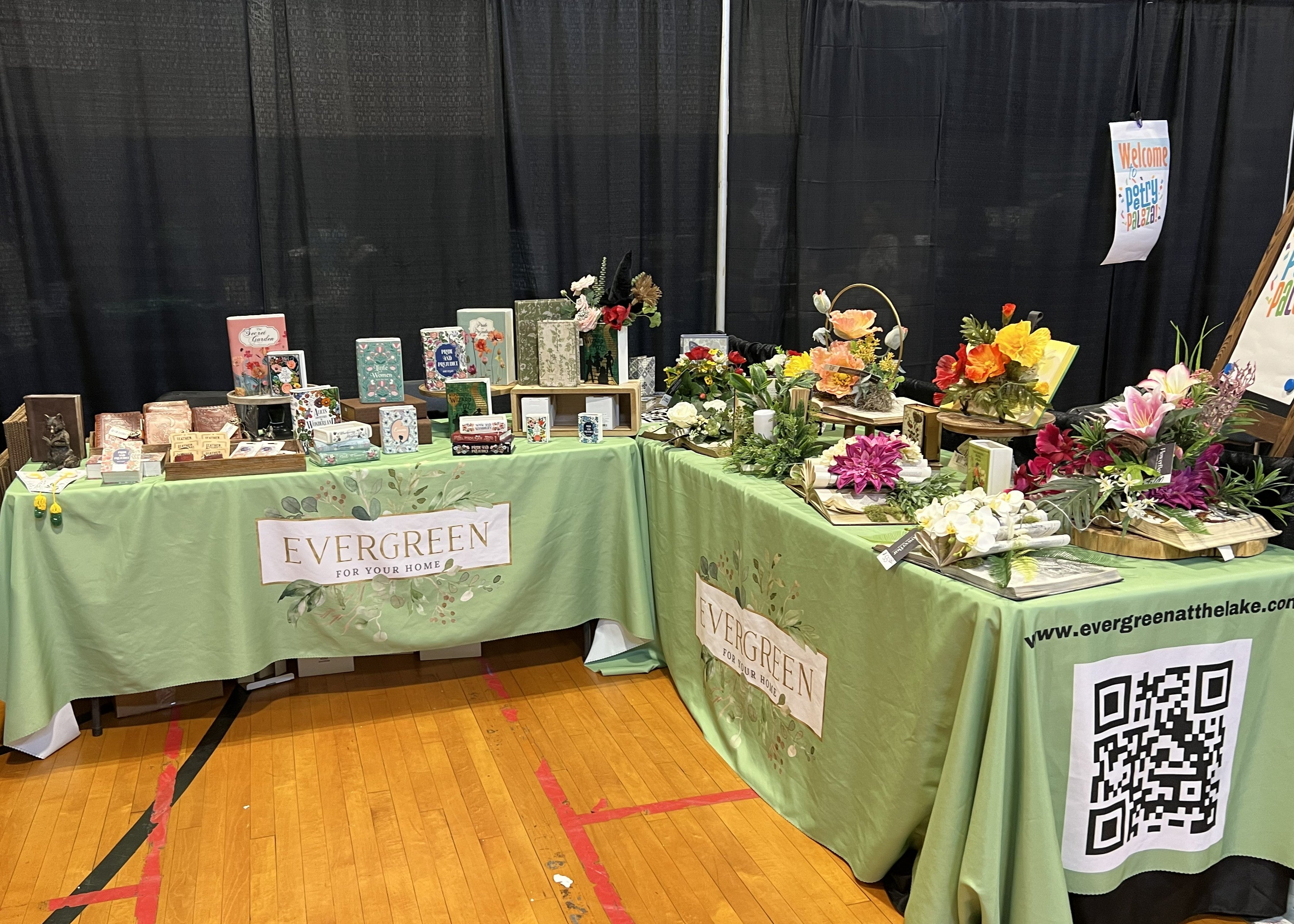 Evergreen book and floral event booth