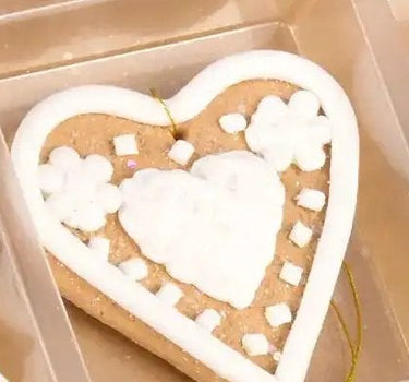 Raz Mini Gingerbread Ornament set, 6 assorted, 2-inch ornaments with white icing in a plastic tray