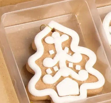 Mini Gingerbread Ornament set (6 assorted, 2-inch) by Raz with white icing on brown cookies in a cardboard tray