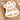 Raz Mini Gingerbread Ornament set, 6 assorted 2-inch ornaments with white icing in a cardboard tray.