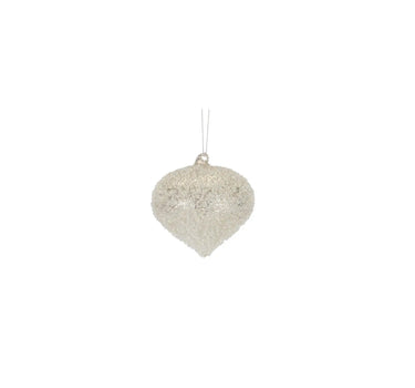 Glass champagne frosted ornament hanging from a silver string