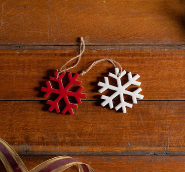 Red and white wood snowflake ornaments (2) on jute strings