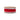 Red ribbon with white pom-pom edge on a spool, unwired, 1.5 in x 10 yd