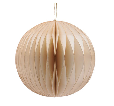 Cream paper ornament with gold-foil ribbed panels, hanging from a gold string.