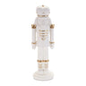 Nutcracker figurine, white resin with gold accents, 11 inches tall.