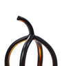 Metal black ribbed pumpkin candle holder with a glowing candle inside, available in two sizes.