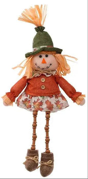 Plush scarecrow shelf sitter, 2-pack, 15-inch tall, by Special T; orange top and leaf-pattern skirt.