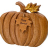 Wood flat pumpkin with tag by Special T; natural wood finish, 8.5 inches tall.