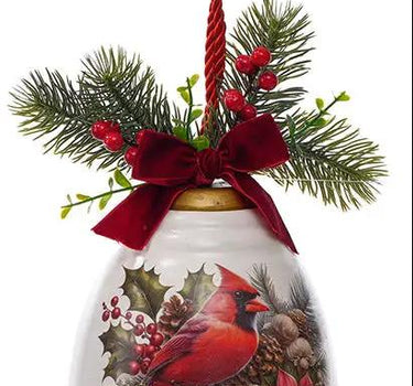 Metal Cardinal Bell with red cardinal, pinecones and holly design, red ribbon, hanging cord.