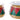 Metal nutcracker drum container pair by Special T, red and green diamond panels with gold trim, two sizes