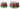 Metal nutcracker drum container pair by Special T, red and green diamond panels with gold trim, two sizes