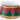 Metal Nutcracker Drum Container by Special T in red and green diamond panels with gold trim.