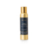 Holiday Champagne Aerosol Room Spray by Aromatique; gold bottle with navy label.