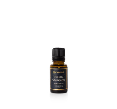 Aromatique Holiday Champagne fragrance oil refill in amber glass bottle with black label