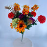 GSC silk artificial shrub bouquet, 25-inch, with red, gold and magenta daisies, dahlias and hydrangeas in a vase.