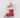 Wooden skate ornament by A&B, red with white trim, twine bow, candy cane and mini tree