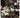 LED Snow Ball Garland 6' length; white fuzzy LED spheres on a string with pine cone accents